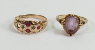 Two 9ct gold rings set amethyst and red stones: Single amethyst ring and 9ct gold dress ring set red