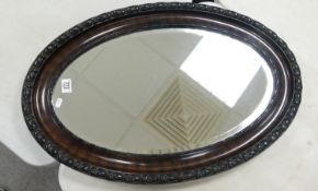 Oval Wooden Framed Wall Mirror: diameter at widest 81cm