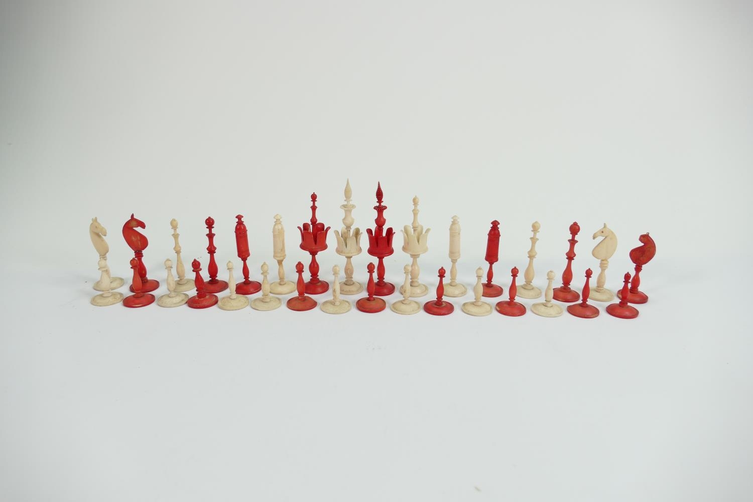 19th Century Finely Carved & Turned Bone Chess Set: damage noted to red knight & white rook,