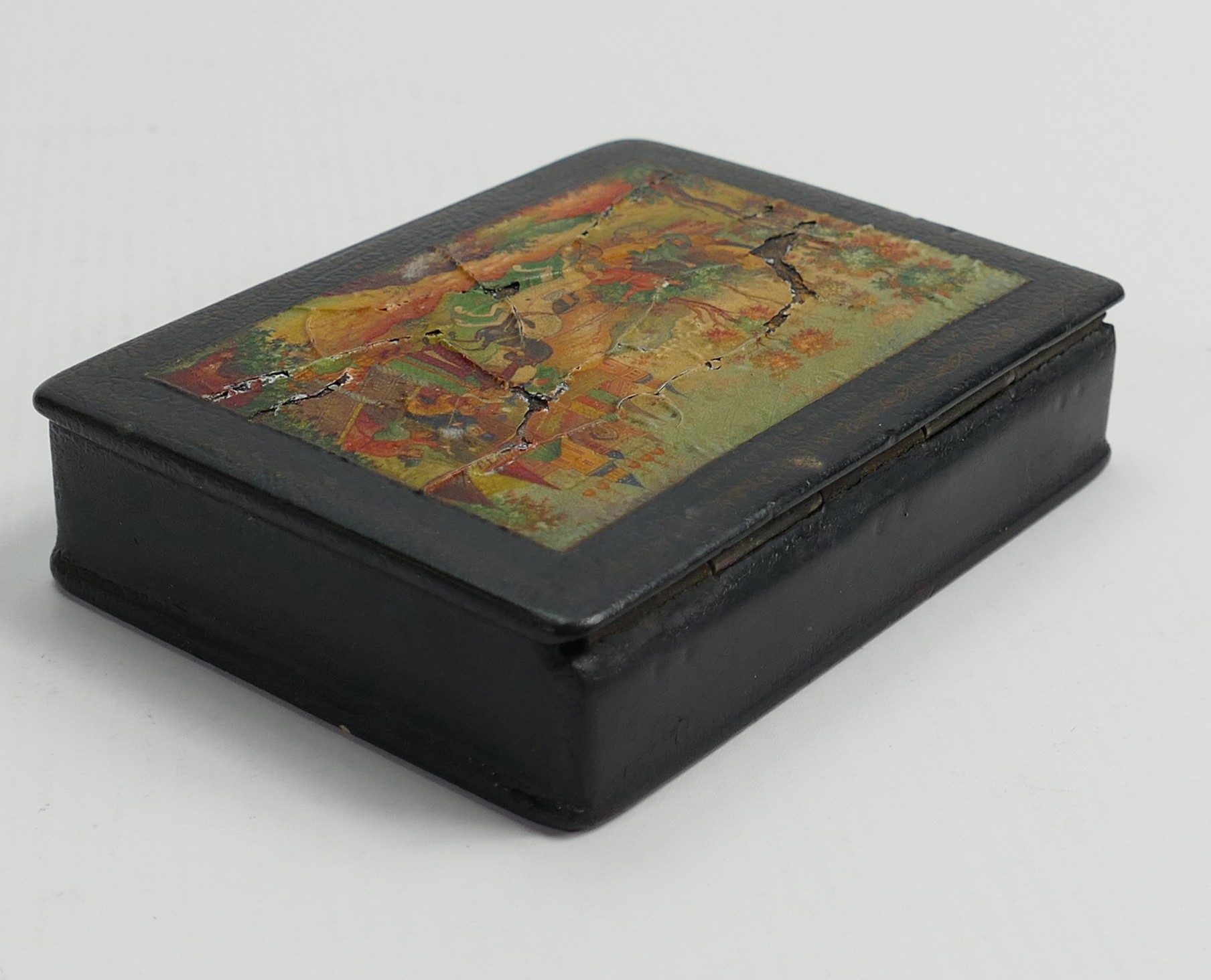 Early 20th century leather box: 8cm x 11cm x 2.5cm.