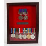 A collection of medals awarded to H Maunders: Comprising Elizabeth General Service medal with Borneo