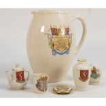 A collection of McIntyre commemorative crested items to include: Ribbon badge, miniature teapot,