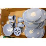 A collection of Wedgwood Blue Jasperware to include: vases, Christmas plates, footed bowl etc