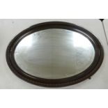 Large Oval Bevel Edged Wall Mirror: diameter at widest 86cm