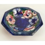 Moorcroft Anemone on blue ground Early Octagonal Bowl: damaged, diameter 26cm