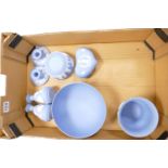 A collection of Blue Wedgwood Jasperware to include: footed bowl, vases, lidded boxes,