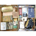 A mixed collection of items to include: boxed Astrad Portable Radio, vintage car badges, tin