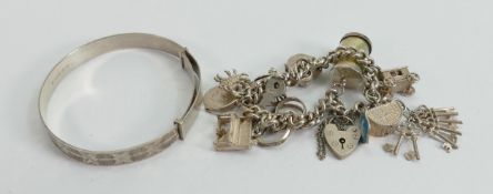 Silver charm bracelet and bangle, 57g: