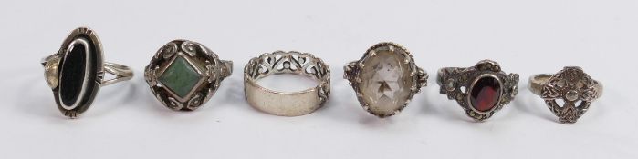 Five vintage ladies silver rings: four set with semi precious stones, gross weight 17.8g.