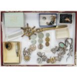 A collection of vintage ladies costume jewellery: including various marquisette brooches, coins,