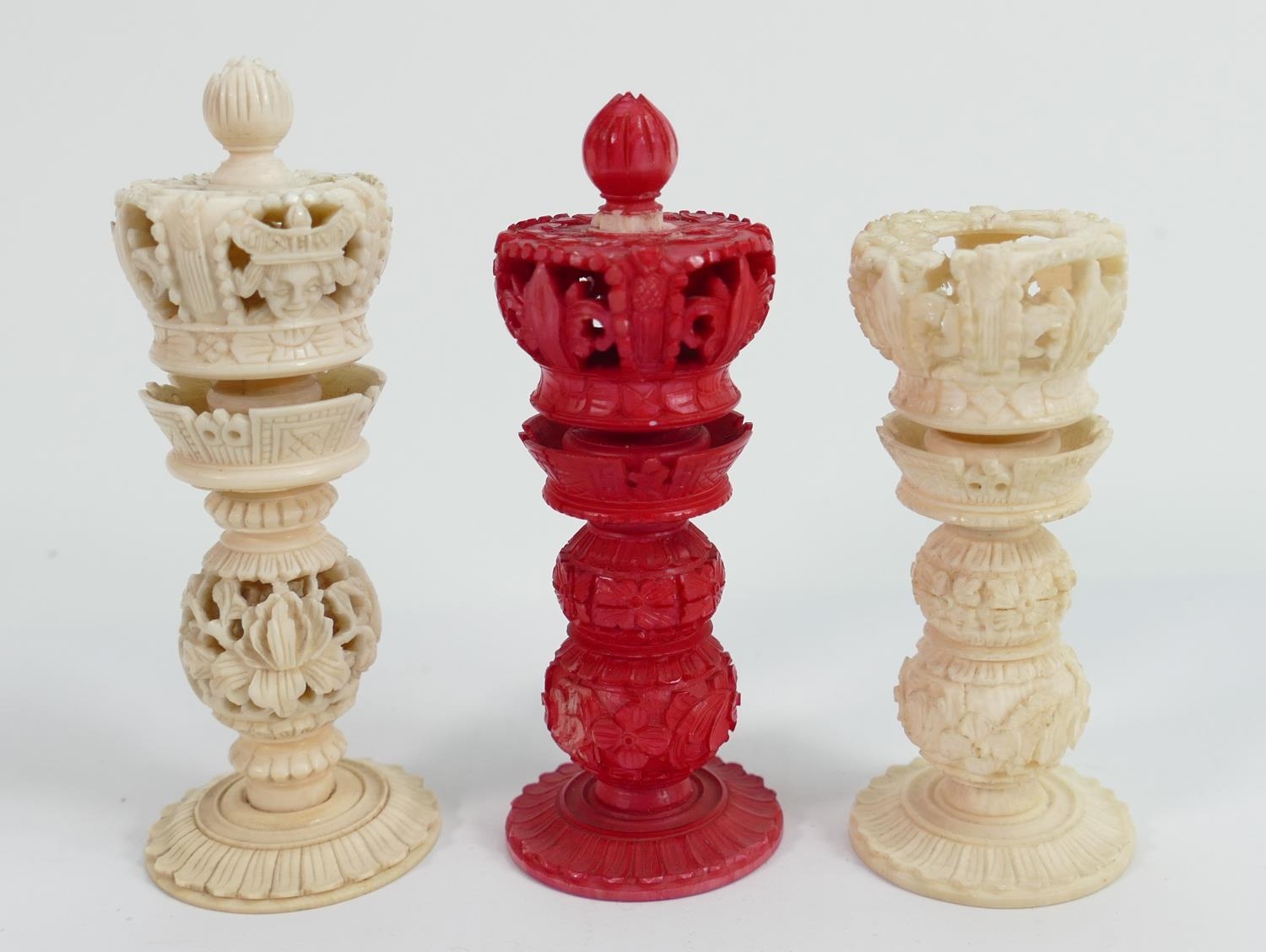 A collection of early Bone Chess Pieces: tallest 9cm,damaged crown on white & top pommel of red