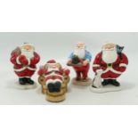 A collection of John Beswick Santa Claus Figures(4):