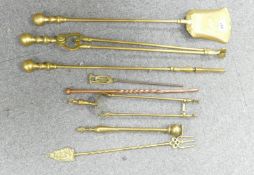 A collection of Brass & Copper Fireside implements: