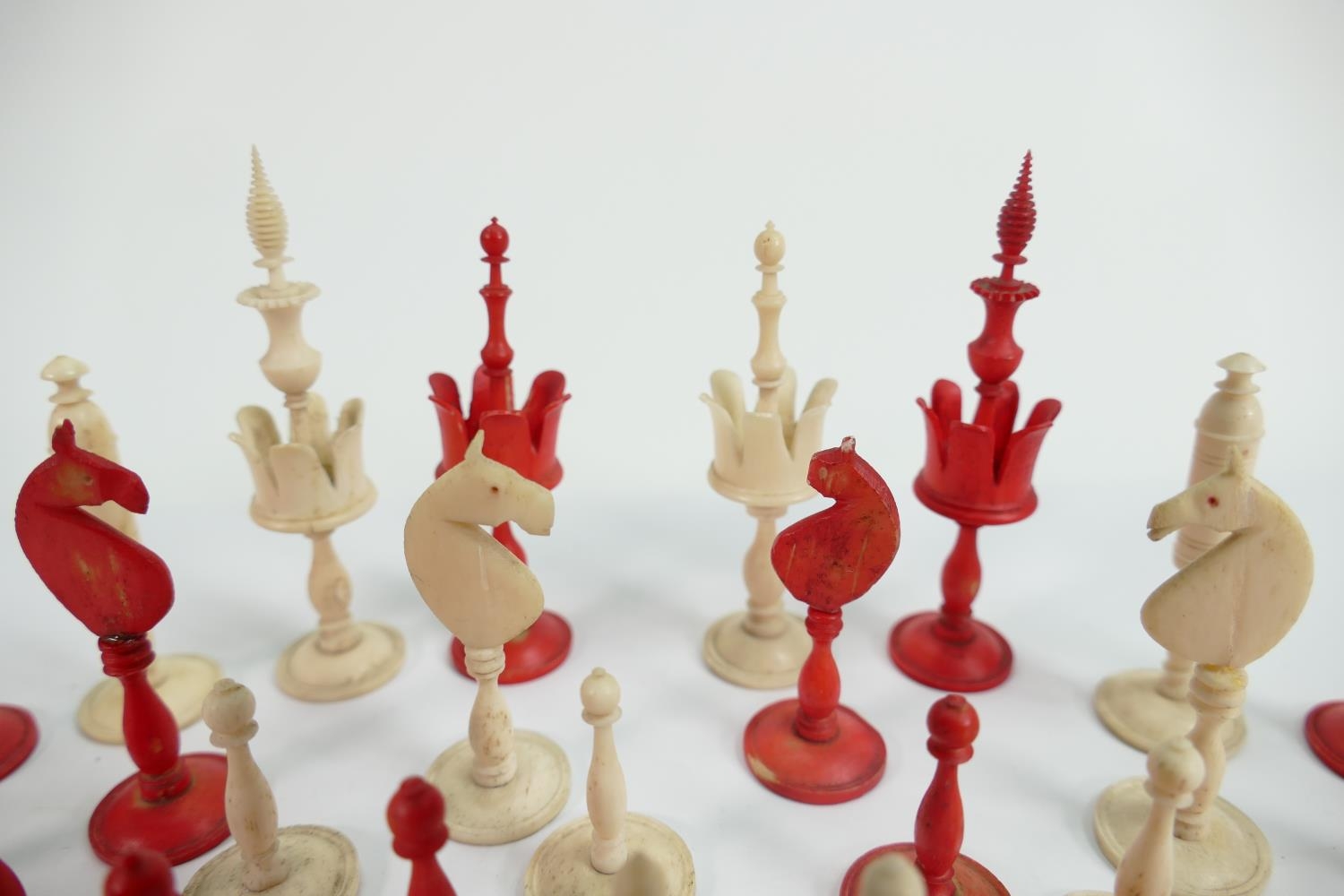 19th Century Finely Carved & Turned Bone Chess Set: damage noted to red knight & white rook, - Image 2 of 5