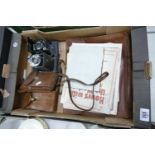 A mixed collection of items to include: Kodak & Penguin Bellows Camera & leather case with sheet