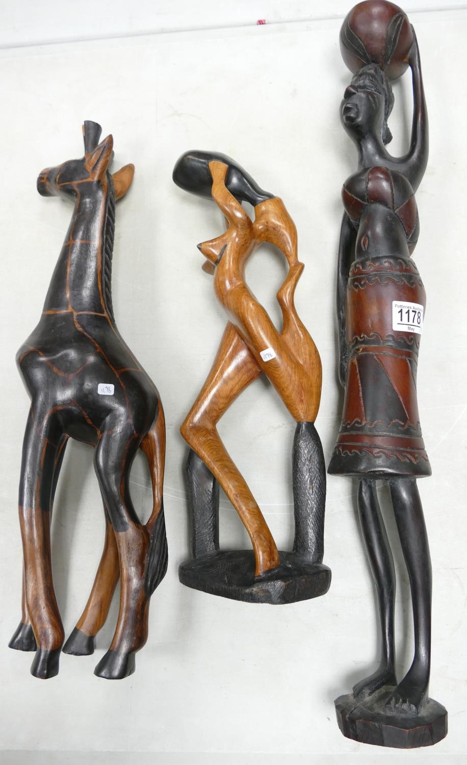 Four Wooden African Theme Figures: height of tallest 65cm(3)