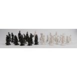 Austrian glazed pottery chess set: Restoration noted to white knight, height of tallest 8cm.