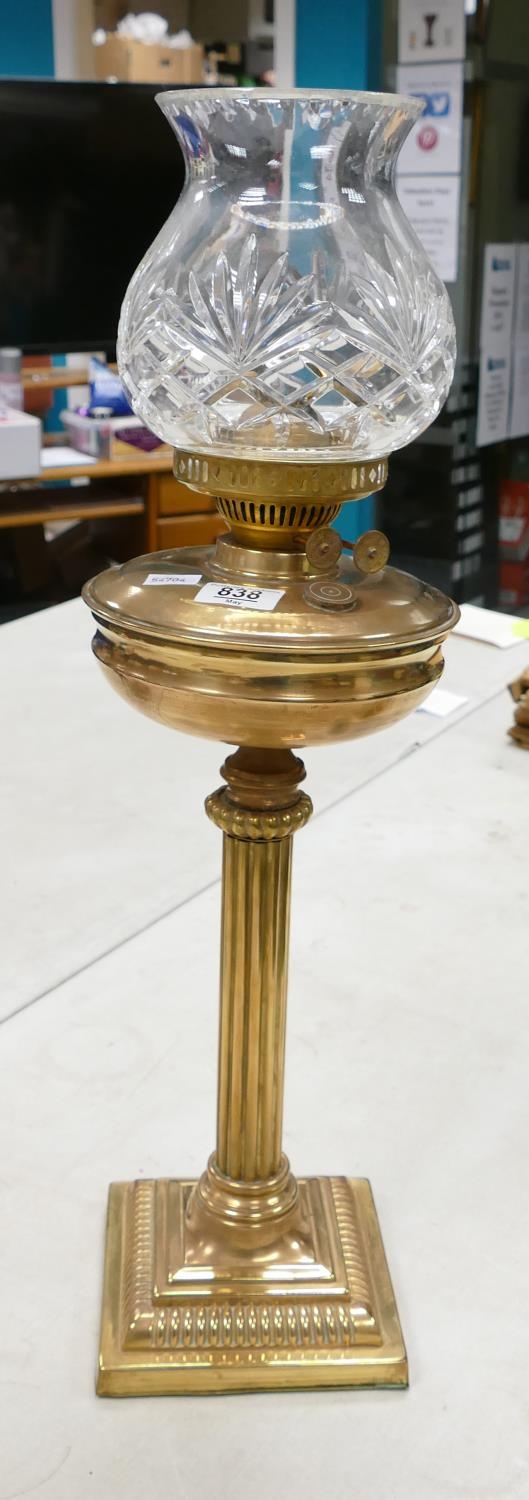 Brass Column Oil Lamp: Duplex burner noted, height 65cm