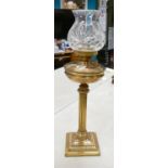 Brass Column Oil Lamp: Duplex burner noted, height 65cm