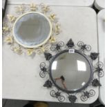 Two circular metal framed mirrors: decorated with leaves. 45.5cm diameter
