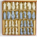 A 20th century porcelain Limoges chess set: Boxed, height of King 7cm.
