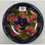 Moorcroft mid century plate in the Pomegranite pattern: Measures 22cm wide. Light localised