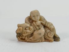 19th Century Chinese Carved Hardstone Figure of immortal seated upon lion dog : height 5.4cm