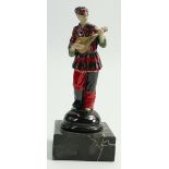 Good porcelain figure of a masked harlequin: Playing a banjo, mounted on marble plinth, height 19cm.