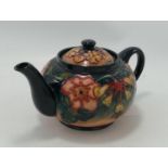 Moorcroft tea pot in the Oberon pattern: Seconds quality, measures 22.5cm wide.