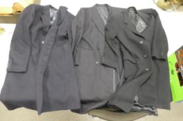 A collection of three Crombie Type Quality Overcoats
