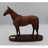 Beswick Arkle on wooden plinth: