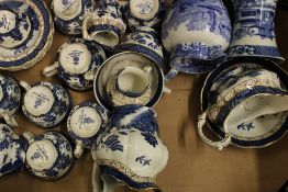 Booths Real Old Willow tea ware and jugs: Spode Italian jug, Blue Willow vase etc (1 tray).