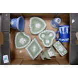 A collection of Wedgwood Sage Green & Blue Jasperware including: pin trays, small urns, lidded