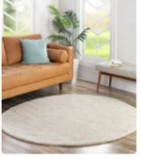 A brand new 'Unique Loom' branded rug: Solid Freize, Ivory, 245cm in diameter (circular).