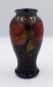 Moorcroft Pomegranate vase: (restored top rim).