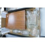 A collection of glass decanters: together with a cased cutlery set ( 1 tray)