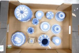 A good collection of Wedgwood Jasperware to include: large biscuit barrel, candlesticks, lidded