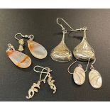 Four pairs of silver earrings: 26g total weight.