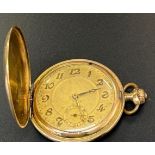 A gold plated pocket watch: working order.