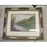 20th Century framed watercolour: of a waterside scene . Signed but signature indistinct . 62cm x
