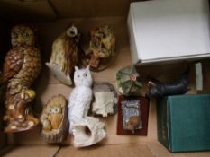 A mixed collection of items to include: resin animal figures, owls, resin cottage etc ( 1 tray)