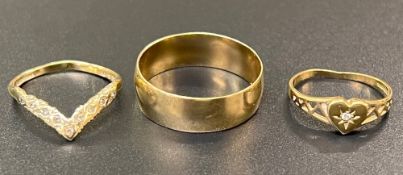 Gents 9ct gold wedding band: together with a ladies wish bone ring and heart ring. Total weight 5.