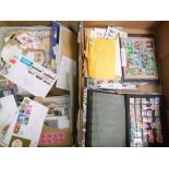 A collection of stamp albums and first day covers: and loose stamps ( 2 trays)