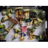 A collection of hand painted figurines by A M Copper: to include birds, lady figures etc ( 1 tray )