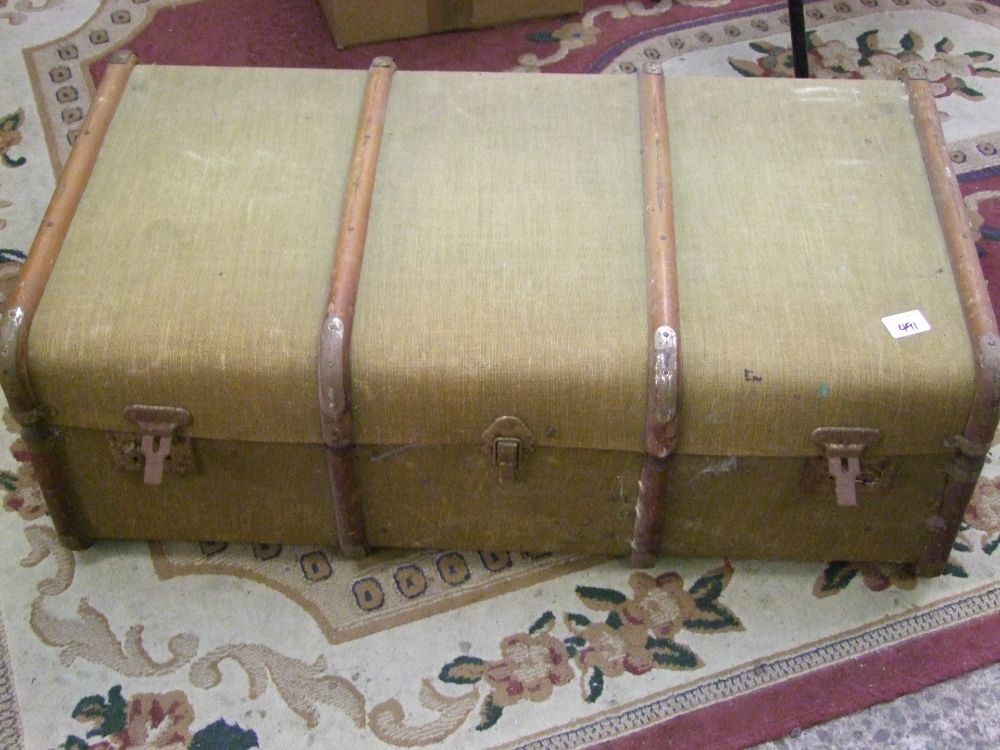 An early 20th century steamer trunk: 90cm x 49cm.