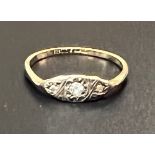 Ladies 18ct gold and diamond ring: weight 1.4 grams