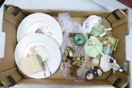 A mixed collection of items to include: Royal Doulton Lady Figure, Wade Whimsies, small character