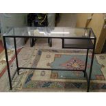 Modern wrought iron and glass console table: 100cm w x 36cm d x 74.5cm h.