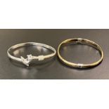 Two silver bangles: 18g total weight.