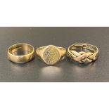 A 9ct gold signet ring: together with a 9ct gold wedding band and a tri-colour 9ct gold ring (